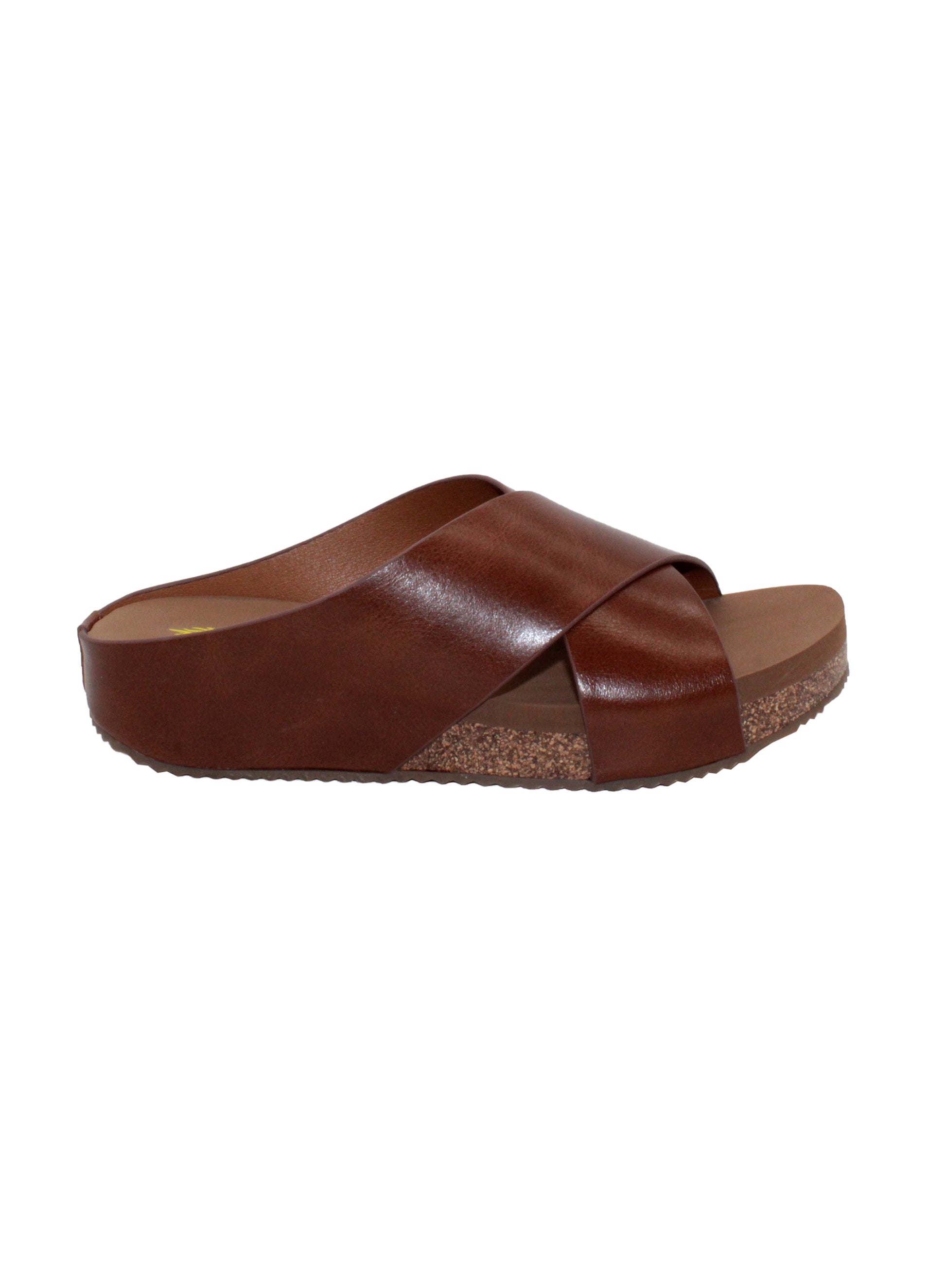 Rustic genuine leather brown Slip-on crisscross sandal style Round toe shape Ultra-comfort EVA insole Cork covered wedge Rubber traction outsole Approx. 1.25” heel height side