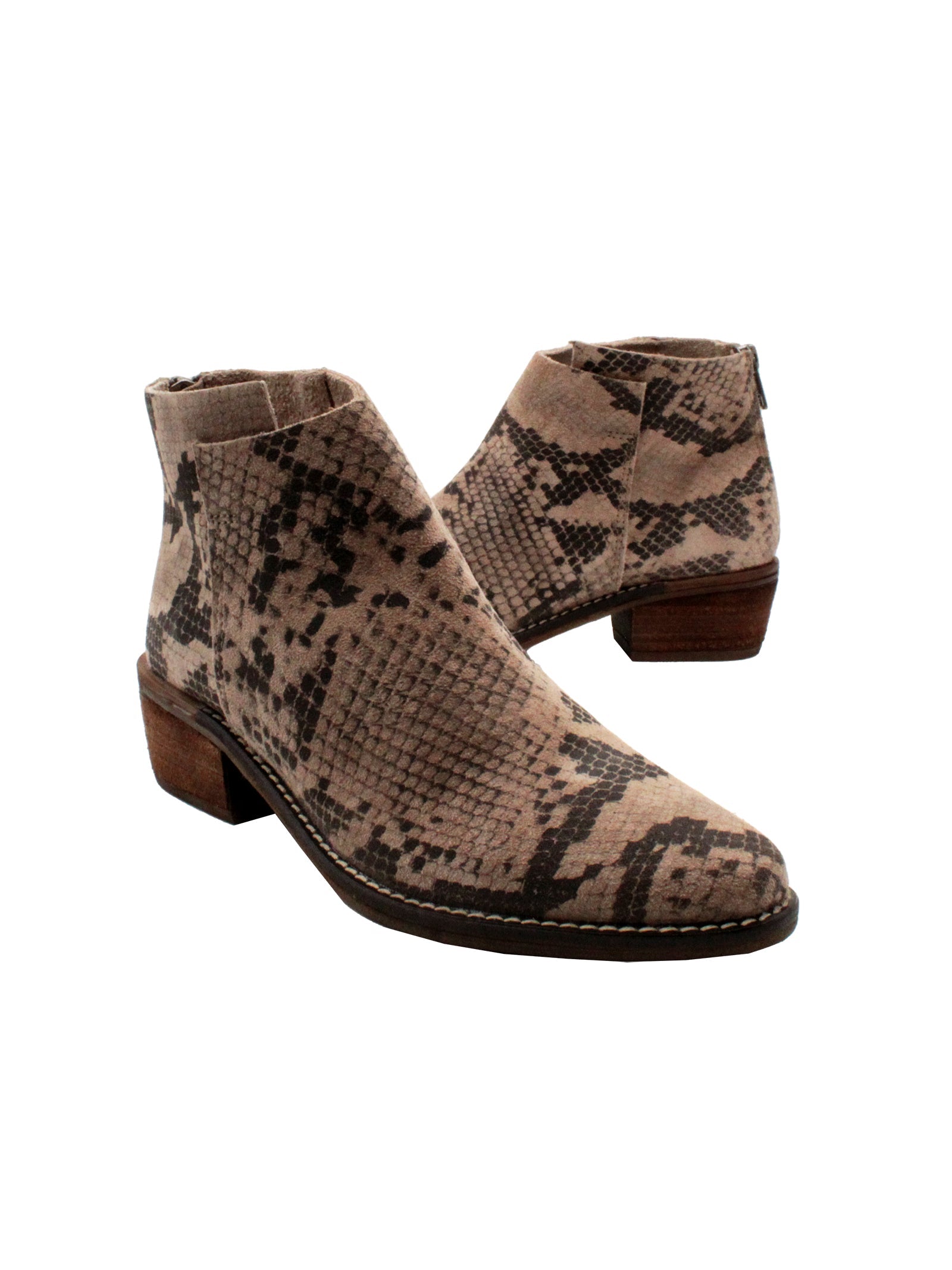 Very Volatile’s hand burnished suede ‘Aldworth’ bootie taupe multi has an asymmetrical topline that adds effortless appeal to this wardrobe essential. Featuring padded insoles set atop sturdy rubber outsoles with stack leather heels and rustic stitched leather welting. 3/4 view angle