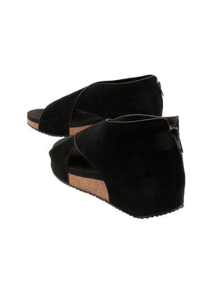 The ‘Alton’ black sandals by Volatile are made from plush genuine suede and designed with crisscross straps that meet in the back for a closed-but-open effect suitable for year-round styling. Featuring Volatile’s signature ultra-comfort EVA insole stationed on a modest low wedge, and durable, non-skid rubber traction soles, these are ideal for all day walking. back