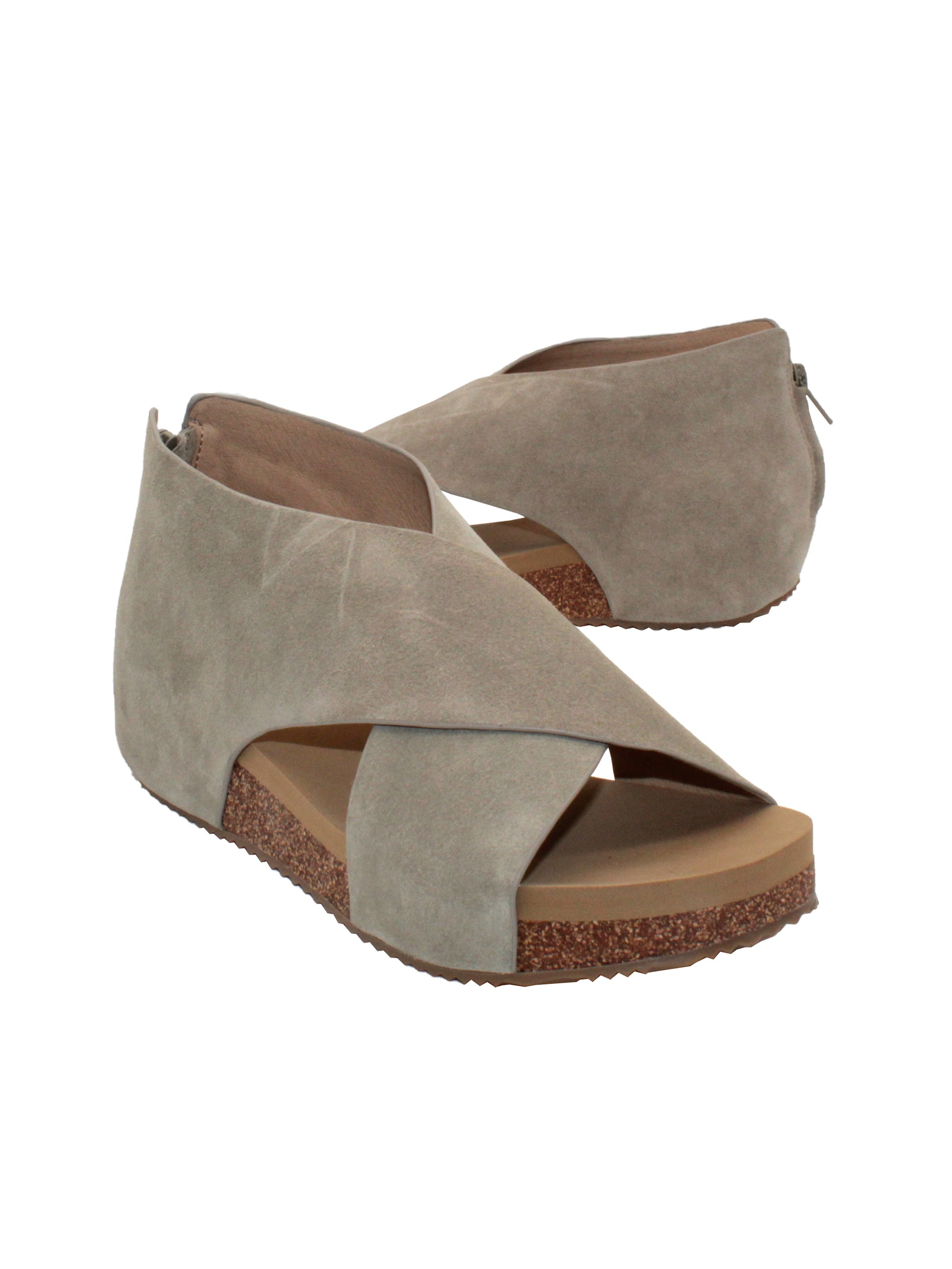 The ‘Alton’ gray sandals by Volatile are made from plush genuine suede and designed with crisscross straps that meet in the back for a closed-but-open effect suitable for year-round styling. Featuring Volatile’s signature ultra-comfort EVA insole stationed on a modest low wedge, and durable, non-skid rubber traction soles, these are ideal for all day walking. 