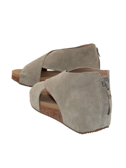 The ‘Alton’ gray sandals by Volatile are made from plush genuine suede and designed with crisscross straps that meet in the back for a closed-but-open effect suitable for year-round styling. Featuring Volatile’s signature ultra-comfort EVA insole stationed on a modest low wedge, and durable, non-skid rubber traction soles, these are ideal for all day walking. back