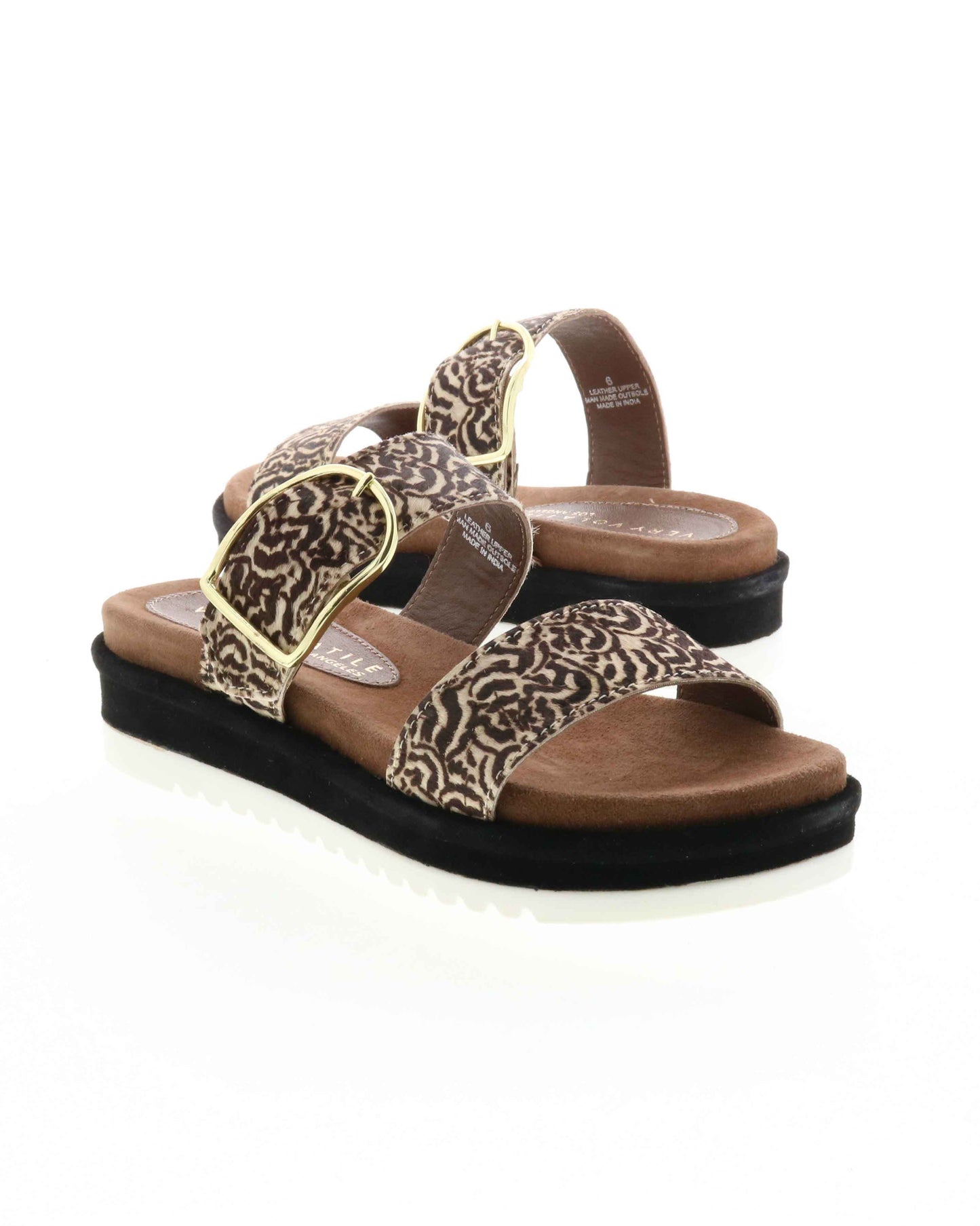 DOUBLE STRAP MINI FLATFORM SANDAL - Genuine calf-hair upper - Leather lining - Adjustable metal buckle - Two band slip-on sandal style - Anatomic suede covered footbed - Suede covered low platform bottom - White ridged outsole - Approx. 1.5" heel height 2