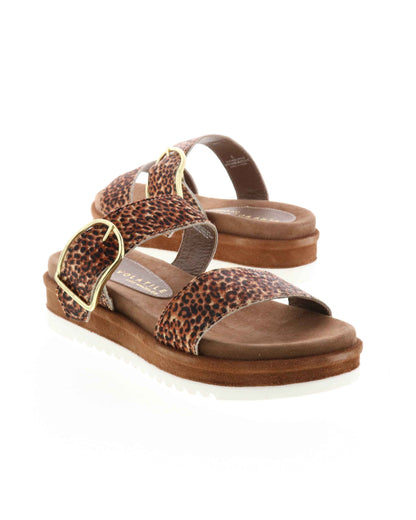 DOUBLE STRAP MINI FLATFORM SANDAL - Genuine calf-hair upper - Leather lining - Adjustable metal buckle - Two band slip-on sandal style - Anatomic suede covered footbed - Suede covered low platform bottom - White ridged outsole - Approx. 1.5" heel height tan leopard  3/4 angle