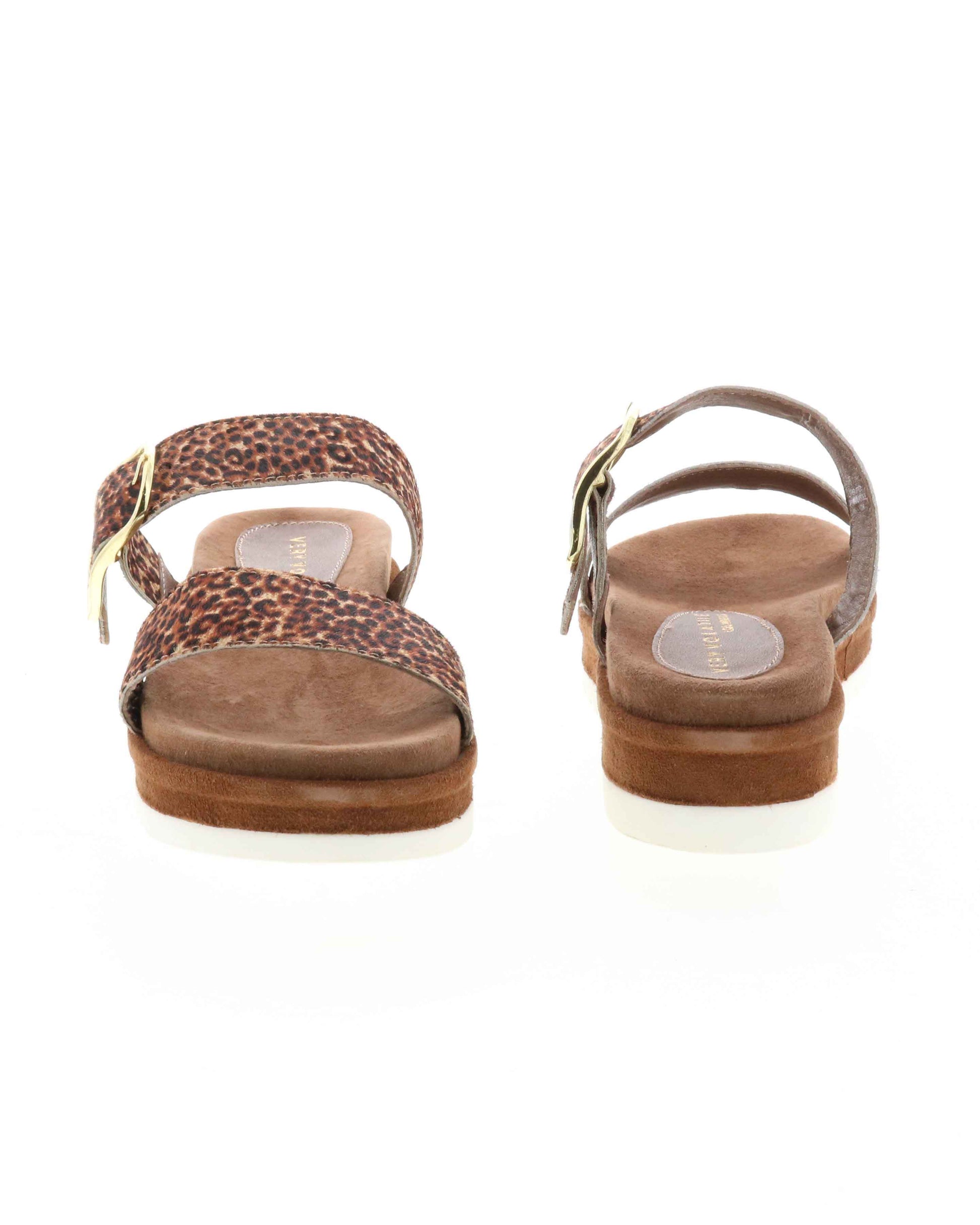 DOUBLE STRAP MINI FLATFORM SANDAL - Genuine calf-hair upper - Leather lining - Adjustable metal buckle - Two band slip-on sandal style - Anatomic suede covered footbed - Suede covered low platform bottom - White ridged outsole - Approx. 1.5" heel height tan leopard front and back