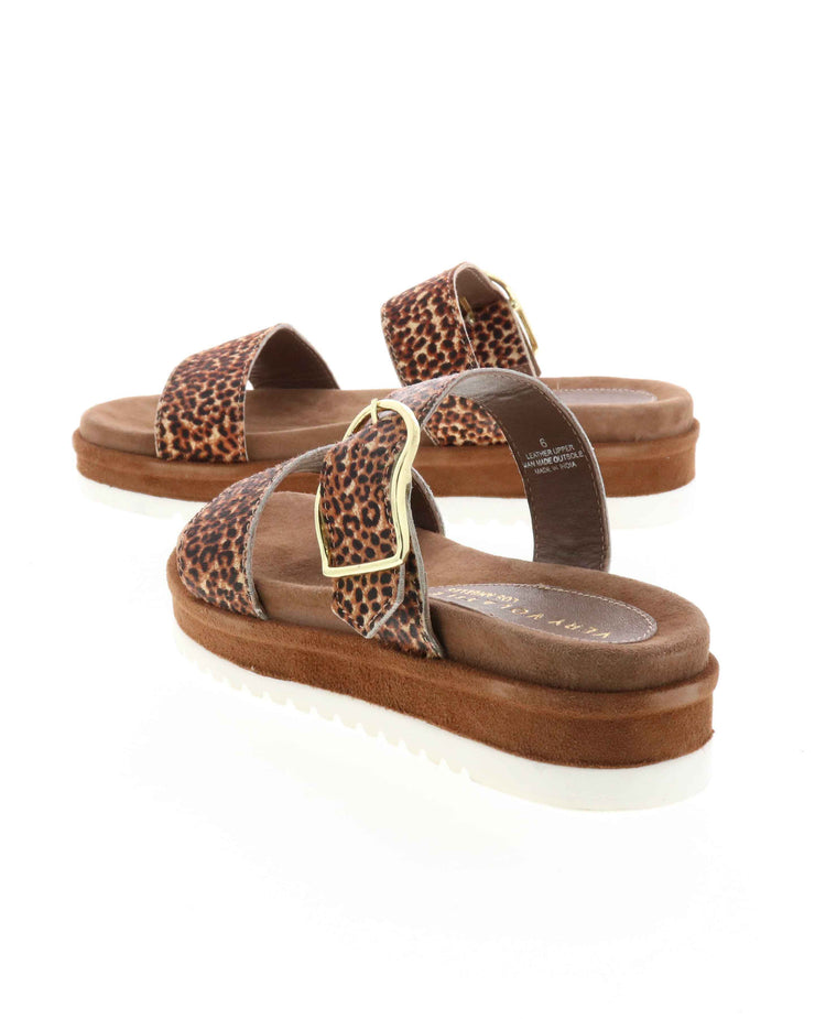DOUBLE STRAP MINI FLATFORM SANDAL - Genuine calf-hair upper - Leather lining - Adjustable metal buckle - Two band slip-on sandal style - Anatomic suede covered footbed - Suede covered low platform bottom - White ridged outsole - Approx. 1.5" heel height tan leopard  back