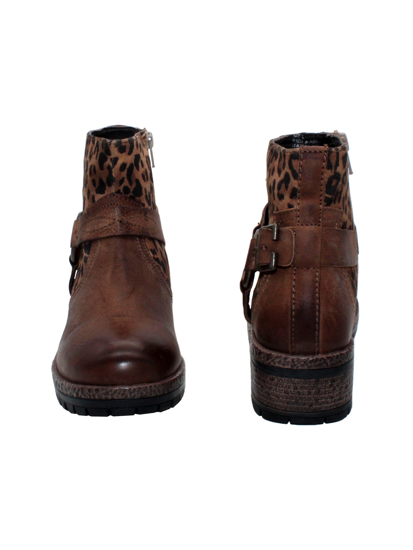 Leather and microfiber leopard printed upper Harness detail with metal buckle and O rings Internal nylon zipper Easy on and off moto bootie style Padded insole Approx. 4.75” shaft height Approx. 1.75" heel height Rubber lug bottom outsole front and back