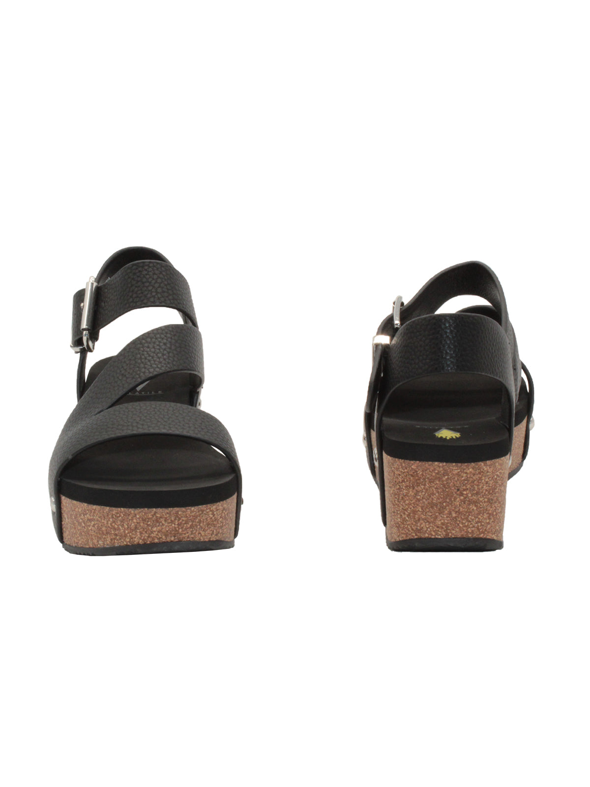 Vegan leather or heavy canvas asymmetrical upper Synthetic lining Adjustable metal buckle and metal clog studs Asymmetrical sandal with back strap Ultra comfort EVA insole Cork wedge Rubber traction outsole Approx. 2” heel height black f&B