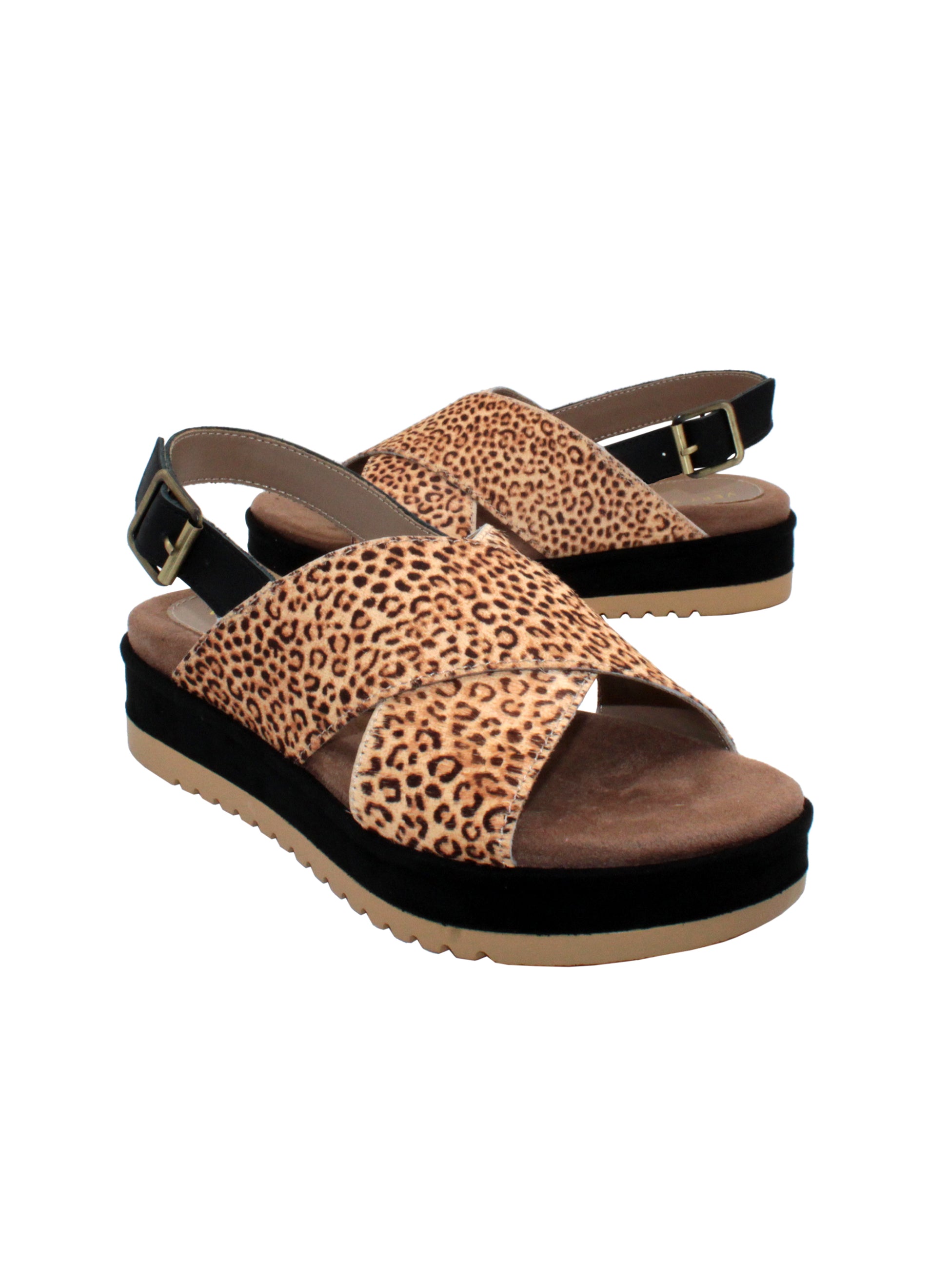 Calabar is Very Volatile’s crisscross sandal with adjustable sling comes to life in genuine animal printed calf hair. Featuring a cushioned footbed for all day wear. Pair this with jeans or your favorite dress for elevated comfort and style tan leopard 3/4 angle