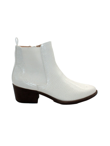 The ‘Carriage’ Chelsea bootie by Volatile, in beautiful rustic effect faux leather or matte metallic faux snake, is right on trend with a wide elastic side panel allowing for flexibility and comfort while walking. We took the level of ease a step further by adding an inside zipper, making these booties effortless to put on and off. The classic toe shape and heel will go with everything, from printed dresses to jeans.