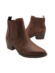 The ‘Carriage’ Chelsea bootie by Volatile, in beautiful rustic effect faux leather or matte metallic faux snake, is right on trend with a wide elastic side panel allowing for flexibility and comfort while walking. We took the level of ease a step further by adding an inside zipper, making these booties effortless to put on and off.  brown