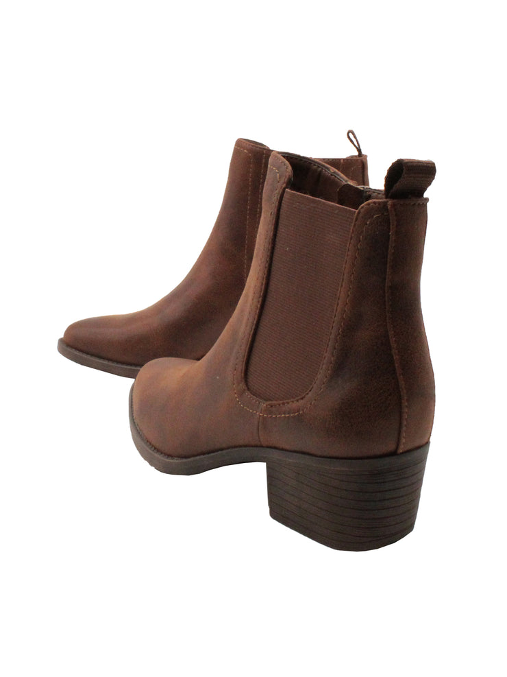 The ‘Carriage’ Chelsea bootie by Volatile, in beautiful rustic effect faux leather or matte metallic faux snake, is right on trend with a wide elastic side panel allowing for flexibility and comfort while walking. We took the level of ease a step further by adding an inside zipper, making these booties effortless to put on and off.  brown4