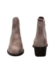 The ‘Carriage’ Chelsea bootie by Volatile, in beautiful rustic effect faux leather or matte metallic faux snake, is right on trend with a wide elastic side panel allowing for flexibility and comfort while walking. We took the level of ease a step further by adding an inside zipper, making these booties effortless to put on and off.  stone front and back