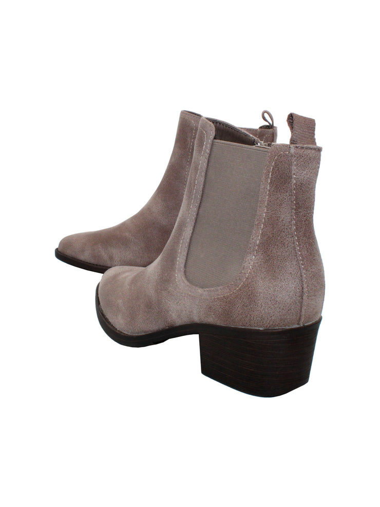 The ‘Carriage’ Chelsea bootie by Volatile, in beautiful rustic effect faux leather or matte metallic faux snake, is right on trend with a wide elastic side panel allowing for flexibility and comfort while walking. We took the level of ease a step further by adding an inside zipper, making these booties effortless to put on and off.  stone bavck