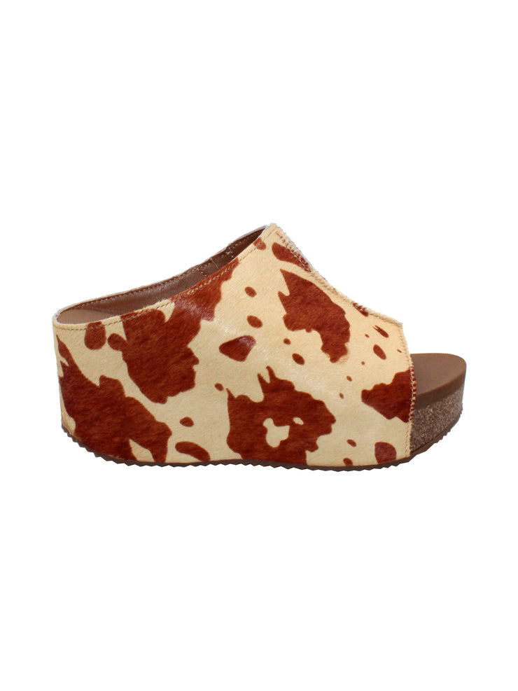 SLIP ON PEEP TOE WEDGE - Suede, hair calf, metallic tonal camo, faux snake upper with butted center seam and inner elastic gore for perfect fit - Slip on design - Leather lining - Signature ultra comfort EVA insole - Rubber traction outsole - Approx. 0.75" platform height - Approx. 2.75" wedge heel height brown cow 
