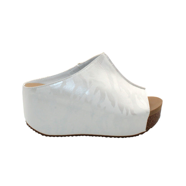 SLIP ON PEEP TOE WEDGE - Suede, hair calf, metallic tonal camo, faux snake upper with butted center seam and inner elastic gore for perfect fit - Slip on design - Leather lining - Signature ultra comfort EVA insole - Rubber traction outsole - Approx. 0.75" platform height - Approx. 2.75" wedge heel height white camo