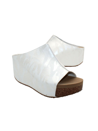 SLIP ON PEEP TOE WEDGE - Suede, hair calf, metallic tonal camo, faux snake upper with butted center seam and inner elastic gore for perfect fit - Slip on design - Leather lining - Signature ultra comfort EVA insole - Rubber traction outsole - Approx. 0.75" platform height - Approx. 2.75" wedge heel height white camo2