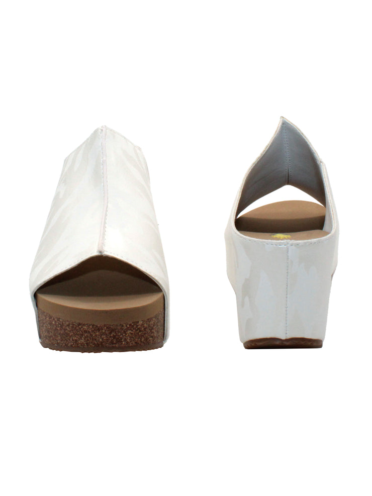 SLIP ON PEEP TOE WEDGE - Suede, hair calf, metallic tonal camo, faux snake upper with butted center seam and inner elastic gore for perfect fit - Slip on design - Leather lining - Signature ultra comfort EVA insole - Rubber traction outsole - Approx. 0.75" platform height - Approx. 2.75" wedge heel height white camo3
