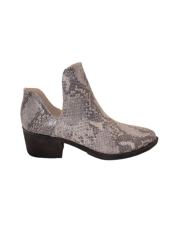 Our fan favorite beige multi CHRONICLE bootie by Volatile has been crafted in exotic materials, embossed faux croco or multicolored faux snake, for the new fall season. The upper features an attractive open shank that complement dresses and jeans alike.  side