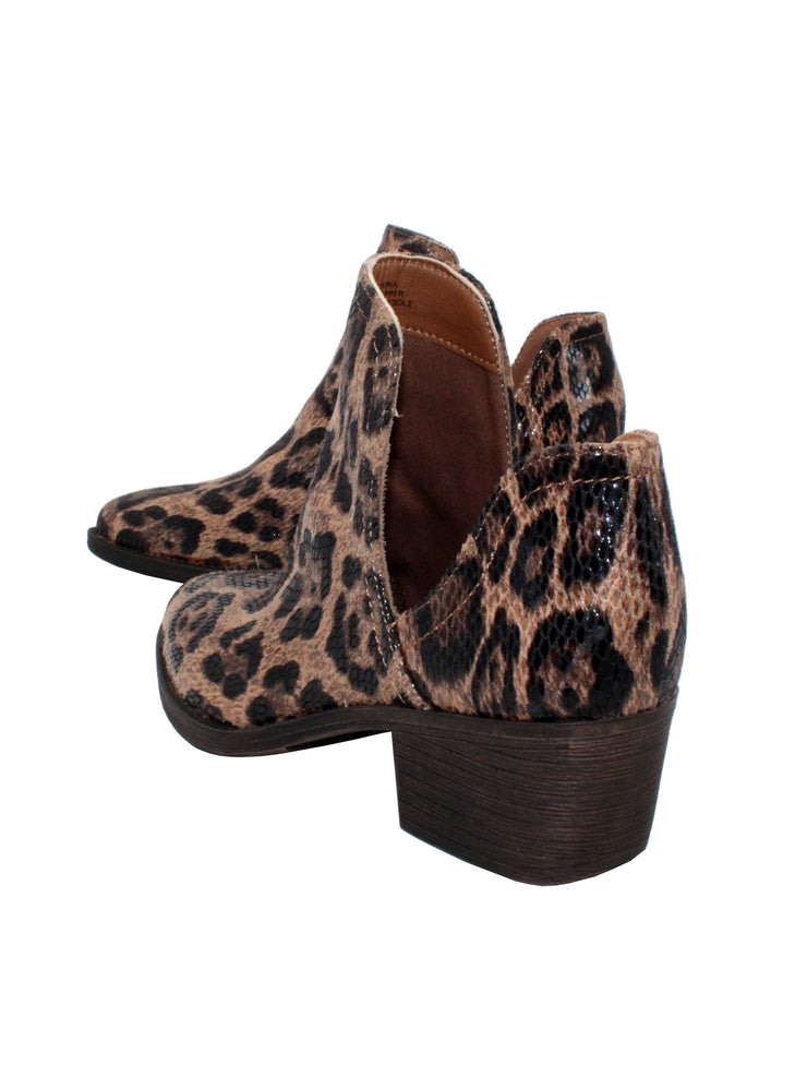 Our fan favorite leopard CHRONICLE bootie by Volatile has been crafted in exotic materials, embossed faux croco or multicolored faux snake, for the new fall season. The upper features an attractive open shank that complement dresses and jeans alike.  back