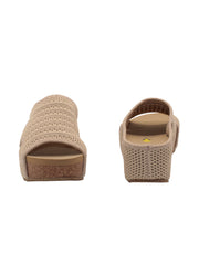 Volatile’s beige stretch knit open toe slide sandal wedge, Covey, takes an ergonomic approach, combining activewear comfort with a fashion silhouette. The stretch knit upper is inspired by running shoes and hugs the foot like a sock while the signature ultra comfort EVA insole is perfect for spending the entire day on your feet. The rubber traction outsole makes these ideal for walking on all surfaces, pair them with cargo shorts for exploring a new city on your next vacation.3