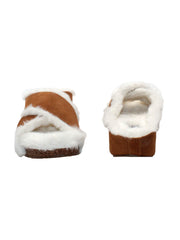 Volatile lovers will instantly recognize the 'Culver’ crisscross slide as the comfort faux fur version of our bestselling ‘Ablette’ sandal. Inspired by slippers, these sandals are ready to keep feet cozy both indoors and outdoors, featuring Volatile’s signature ultra-comfort EVA insole and non-skid, durable rubber traction outsole. Try pairing them with a lounge wear or knit pants. front and back