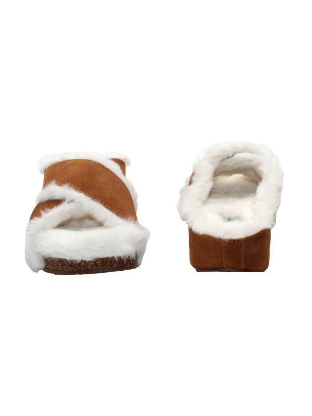 Volatile lovers will instantly recognize the 'Culver’ crisscross slide as the comfort faux fur version of our bestselling ‘Ablette’ sandal. Inspired by slippers, these sandals are ready to keep feet cozy both indoors and outdoors, featuring Volatile’s signature ultra-comfort EVA insole and non-skid, durable rubber traction outsole. Try pairing them with a lounge wear or knit pants. front and back