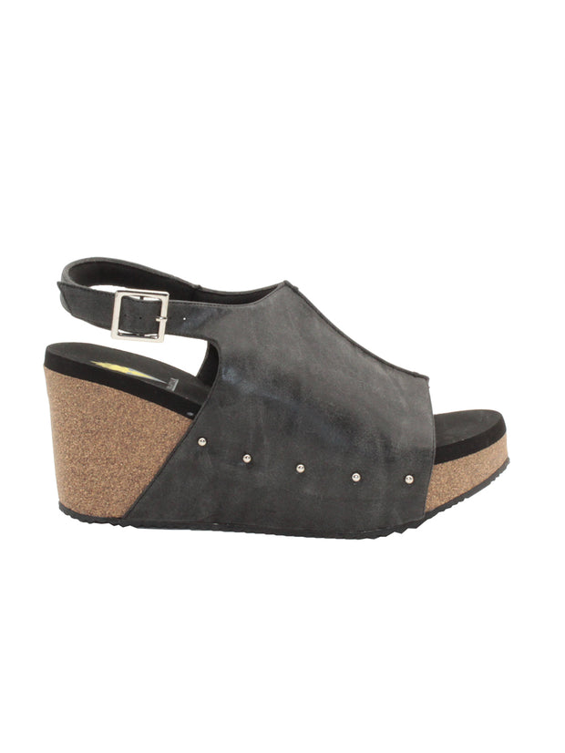 One of Volatile’s classic signature styles, the black Division wedge sandal brings ultra-comfort to casual fashion like no other. The adjustable ankle strap offers stability, the padded lining and signature ultra-comfort EVA insole keeps feet feeling rested even after a full day of adventure, and the rubber traction outsole means these are safe for walking on any surface. Pack these for your next trip to wear with shorts for sightseeing and a flowy dress for special events.
