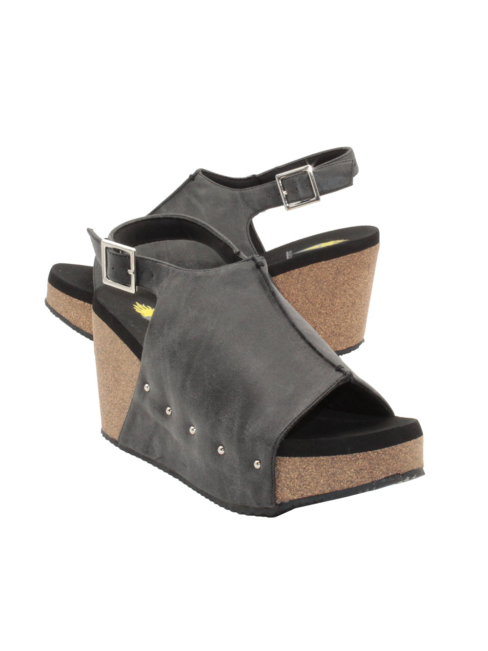One of Volatile’s classic signature styles, the black Division wedge sandal brings ultra-comfort to casual fashion like no other. The adjustable ankle strap offers stability, the padded lining and signature ultra-comfort EVA insole keeps feet feeling rested even after a full day of adventure, and the rubber traction outsole means these are safe for walking on any surface. Pack these for your next trip to wear with shorts for sightseeing and a flowy dress for special events.2