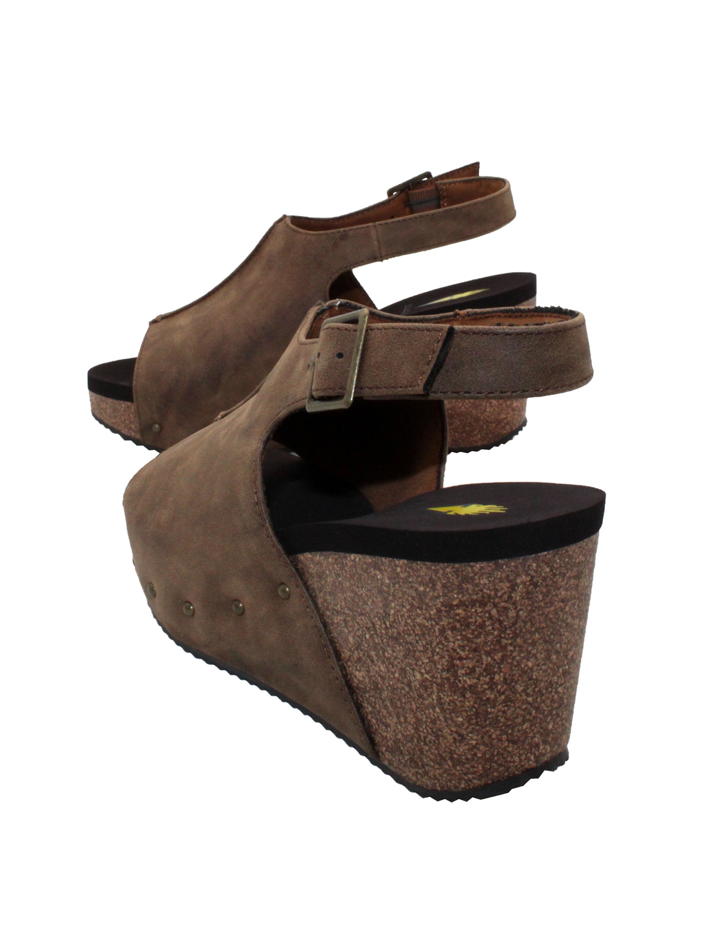 One of Volatile’s classic signature styles, the brown Division wedge sandal brings ultra-comfort to casual fashion like no other. The adjustable ankle strap offers stability, the padded lining and signature ultra-comfort EVA insole keeps feet feeling rested even after a full day of adventure, and the rubber traction outsole means these are safe for walking on any surface. Pack these for your next trip to wear with shorts for sightseeing and a flowy dress for special events. back