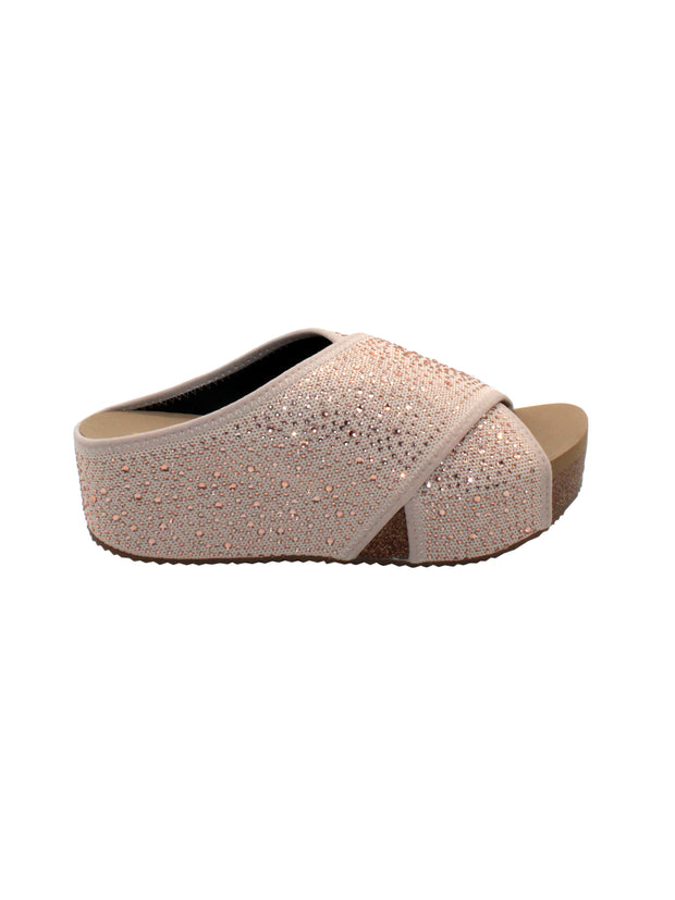 Volatile's Dixiedust crisscross slide is inspired by slippers. These sandals are ready to shine this Spring and Summer. These keep your feet cozy both indoors and outdoors, featuring Volatile’s signature ultra-comfort EVA insole and non-skid, durable rubber traction outsole. Try pairing them with a shiny dress or denim jeans. champagne 1