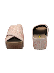 Volatile's Dixiedust crisscross slide is inspired by slippers. These sandals are ready to shine this Spring and Summer. These keep your feet cozy both indoors and outdoors, featuring Volatile’s signature ultra-comfort EVA insole and non-skid, durable rubber traction outsole. Try pairing them with a shiny dress or denim jeans. champagne 3