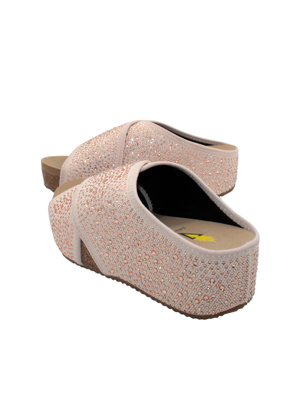 Volatile's Dixiedust crisscross slide is inspired by slippers. These sandals are ready to shine this Spring and Summer. These keep your feet cozy both indoors and outdoors, featuring Volatile’s signature ultra-comfort EVA insole and non-skid, durable rubber traction outsole. Try pairing them with a shiny dress or denim jeans. champagne4