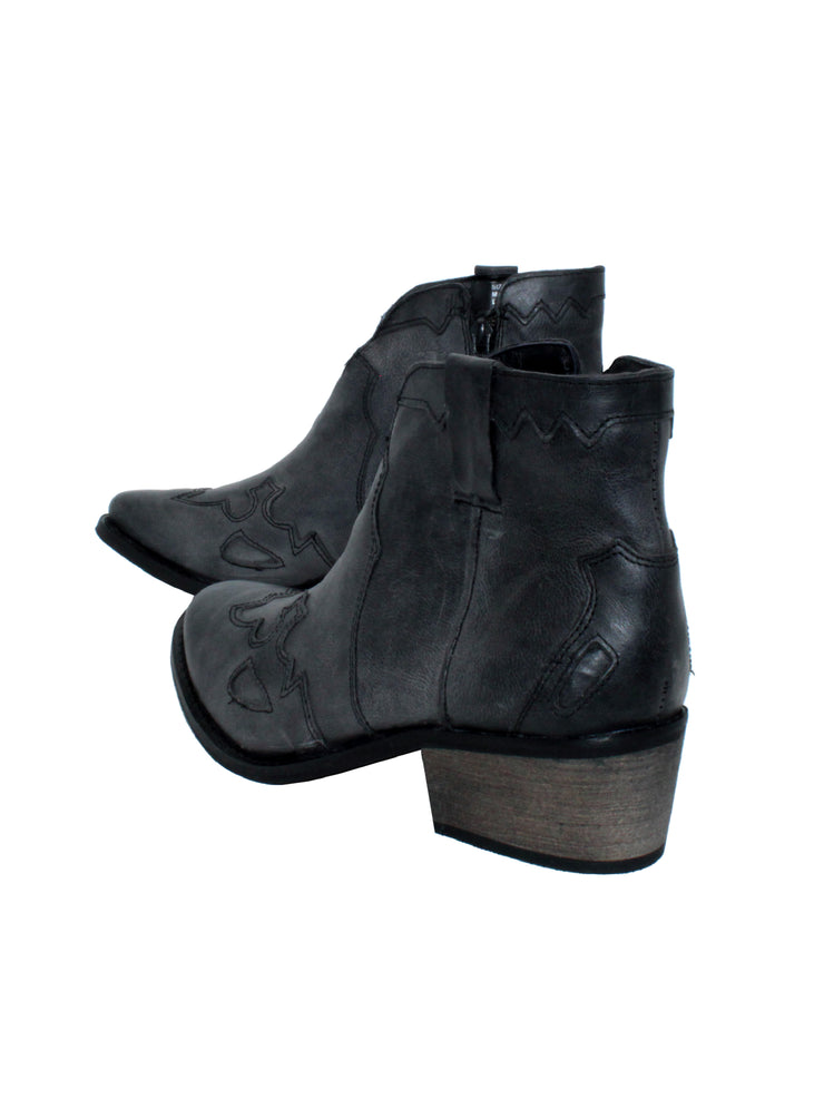 Very Volatile’s ‘Drexel’ bootie is a western inspired ankle boot made in rich burnished leather. Featuring a dipped front topline, western overlays, and genuine stack heel. The inside zipper and self pull loops allow for easy on and off. Pair these with your favorite jeans and chunky sweater for the ultimate fall look. 