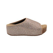 Volatile’s Festina open toe slide in sparkling stretch knit was an instant hit when it first launched and has since become one of our classic styles, offering total comfort in a chic silhouette with a shimmer to keep things joyful. The soft, stretch knit upper gently hugs the foot while our signature ultra comfort EVA insole keeps soles restful, even after a full day of being on your feet. Perfect for all day special events. blush 