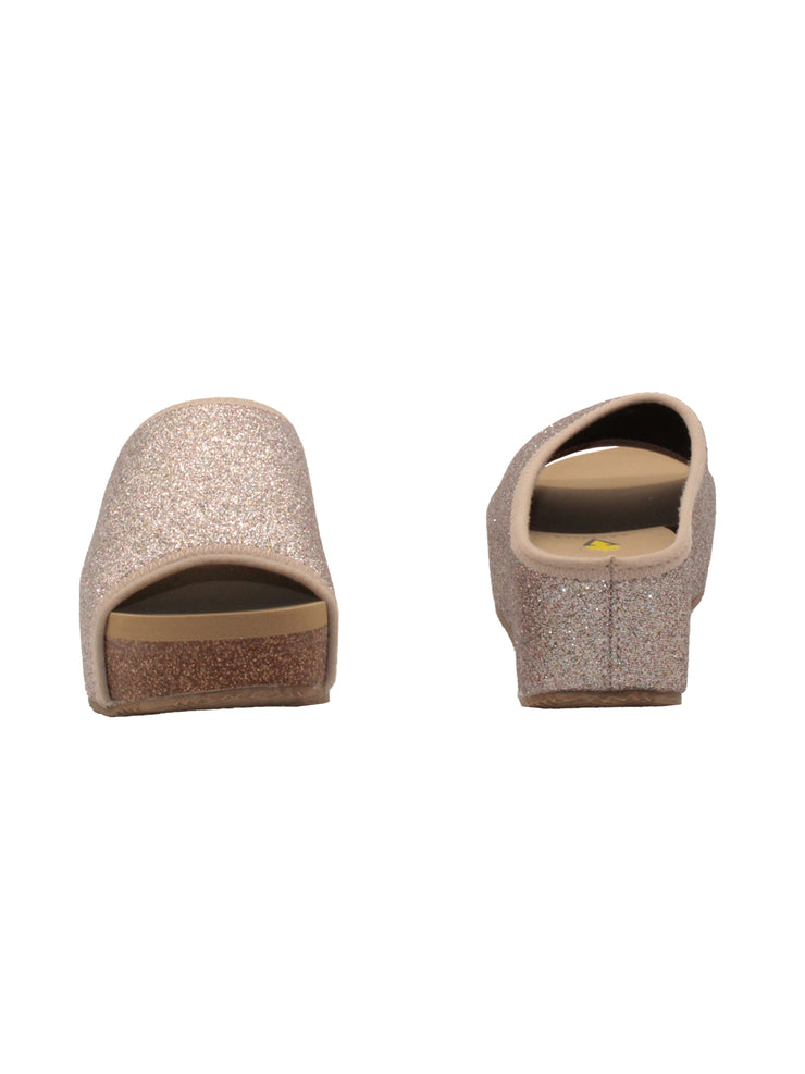Volatile’s Festina open toe slide in sparkling stretch knit was an instant hit when it first launched and has since become one of our classic styles, offering total comfort in a chic silhouette with a shimmer to keep things joyful. The soft, stretch knit upper gently hugs the foot while our signature ultra comfort EVA insole keeps soles restful, even after a full day of being on your feet. Perfect for all day special events. blush  3