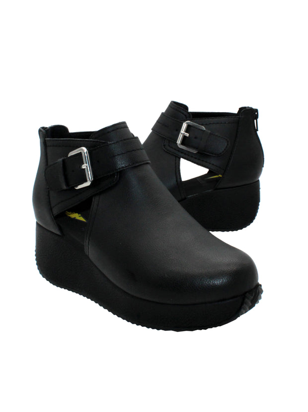 Volatile’s ultra-versatile ‘Flagstaff’ bootie gives you a lift with an easy to wear wedge that is balanced by a substantial platform, making it comfortable to walk in all day. It has a side cut out detail, large adjustable metal buckle, and back zipper so you can slip these on with ease. 