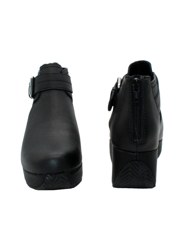 Volatile’s ultra-versatile ‘Flagstaff’ bootie gives you a lift with an easy to wear wedge that is balanced by a substantial platform, making it comfortable to walk in all day. It has a side cut out detail, large adjustable metal buckle, and back zipper so you can slip these on with ease. 