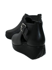 Volatile’s ultra-versatile ‘Flagstaff’ bootie gives you a lift with an easy to wear wedge that is balanced by a substantial platform, making it comfortable to walk in all day. It has a side cut out detail, large adjustable metal buckle, and back zipper so you can slip these on with ease. 