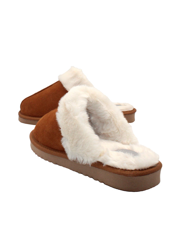 Volatile’s FLUFF slide slippers in genuine suede or leopard print microsuede are designed to keep you cozy indoors and outdoors too. They feature plush faux shearling on the collar, lining, and insole for ultimate comfort and the lightweight rubber sponge outsole provides a pillowy shock absorption. Slip them on with your favorite lounge set. 4
