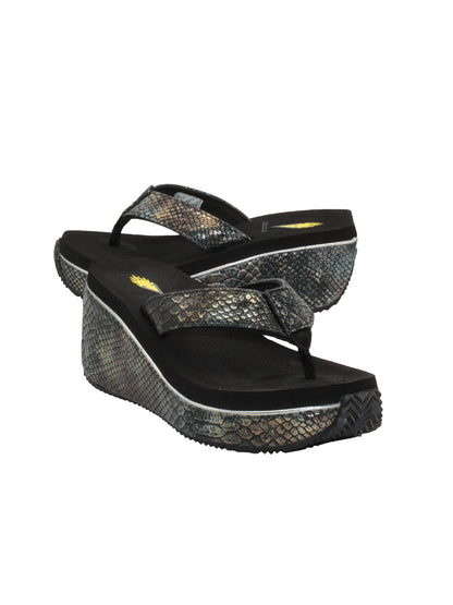 Volatile’s bestselling Frappachino wedge sandal is a style that transcends the trends and is available in our classic black and brown genuine leather versions, or, in this season’s new metallic embossed snake print for a fresh update. They feature Volatile’s signature ultra comfort EVA insole for all day comfort. black metal snake 2