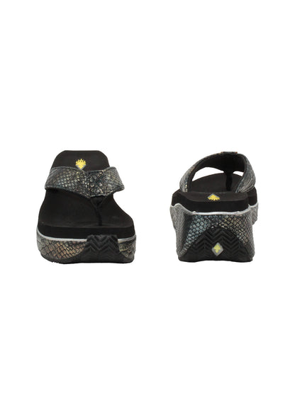 Volatile’s bestselling Frappachino wedge sandal is a style that transcends the trends and is available in our classic black and brown genuine leather versions, or, in this season’s new metallic embossed snake print for a fresh update. They feature Volatile’s signature ultra comfort EVA insole for all day comfort. black metal snake 3