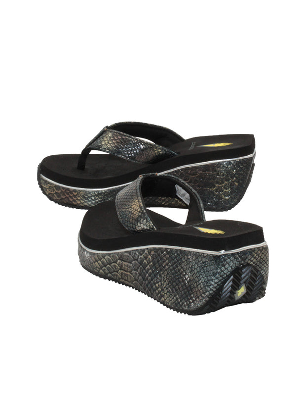 Volatile’s bestselling Frappachino wedge sandal is a style that transcends the trends and is available in our classic black and brown genuine leather versions, or, in this season’s new metallic embossed snake print for a fresh update. They feature Volatile’s signature ultra comfort EVA insole for all day comfort. black metal snake 4