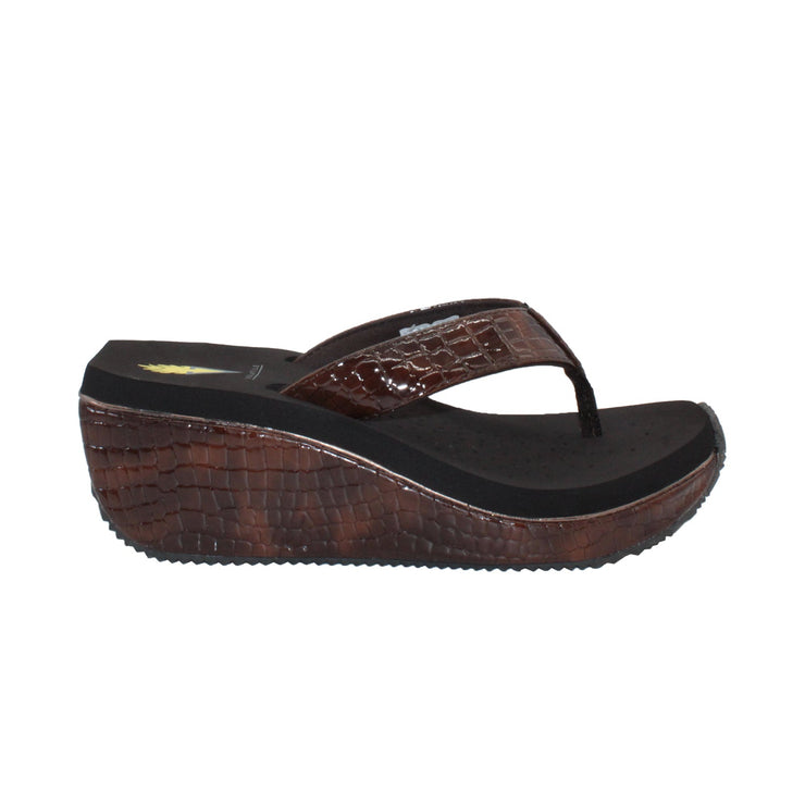  Volatile’s bestselling Frappachino wedge sandal is a style that transcends the trends and is available in our classic black and brown genuine leather versions, or, in this season’s new metallic embossed snake print for a fresh update. They feature Volatile’s signature ultra comfort EVA insole for all day comfort. brown croco 