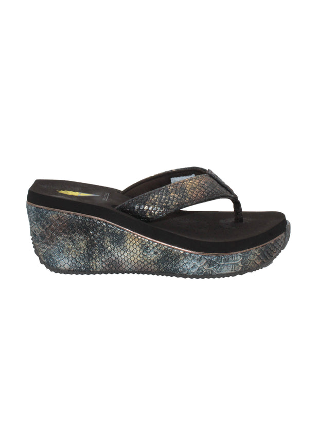 Volatile’s bestselling Frappachino wedge sandal is a style that transcends the trends and is available in our classic black and brown genuine leather versions, or, in this season’s new metallic embossed snake print for a fresh update. They feature Volatile’s signature ultra comfort EVA insole for all day comfort. brown metal snake 
