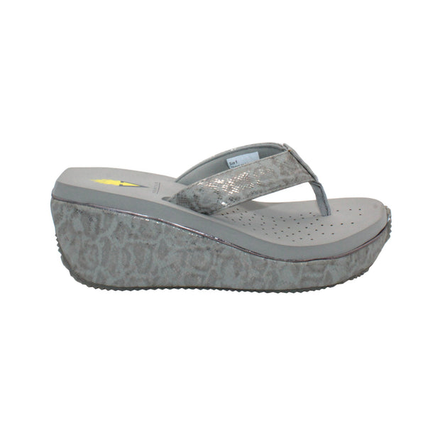 Volatile’s bestselling Frappachino wedge sandal is a style that transcends the trends and is available in our classic black and brown genuine leather versions, or, in this season’s new metallic embossed snake print for a fresh update. They feature Volatile’s signature ultra comfort EVA insole for all day comfort. grey python