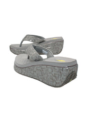 Volatile’s bestselling Frappachino wedge sandal is a style that transcends the trends and is available in our classic black and brown genuine leather versions, or, in this season’s new metallic embossed snake print for a fresh update. They feature Volatile’s signature ultra comfort EVA insole for all day comfort. grey python 4