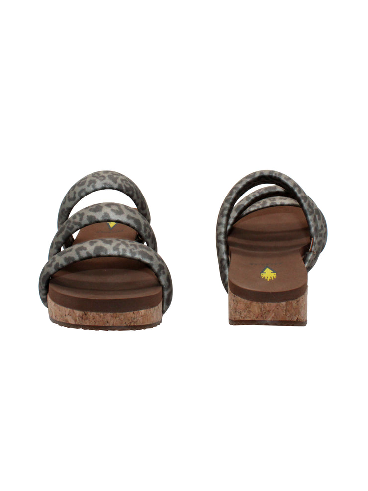 Introduce Volatile's slip-on three band sandal, the 'Gillette' in metallic leopard padded straps. Featuring Volatile’s signature ultra-comfort EVA insole and non-skid, durable rubber traction outsole for all day, elevated ease. Slip them on with everything from jeans to lounge wear. pewter 3