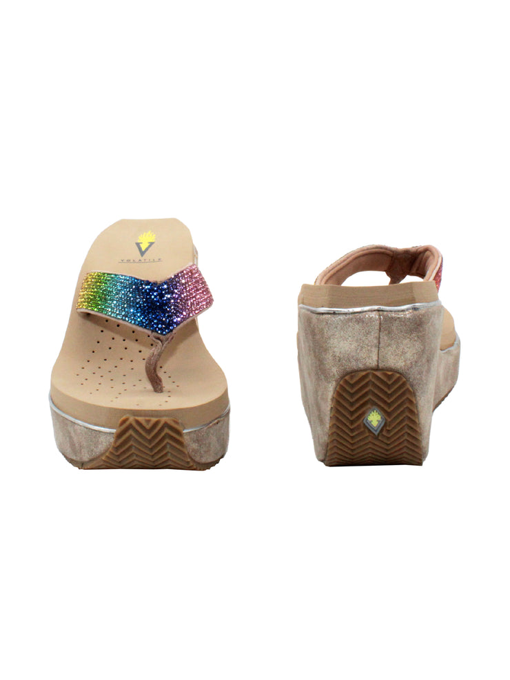 Volatile’s Glimpse platform wedge sandal’s leather upper straps are embellished with sparkling rhinestones. The classic thong style has a soft fabric post that rests gently between your toes, and the signature ultra-comfort EVA insole provides all day comfort. Perfect for special occasions, they’ll complement everything from dresses to jeans. beige multi 3