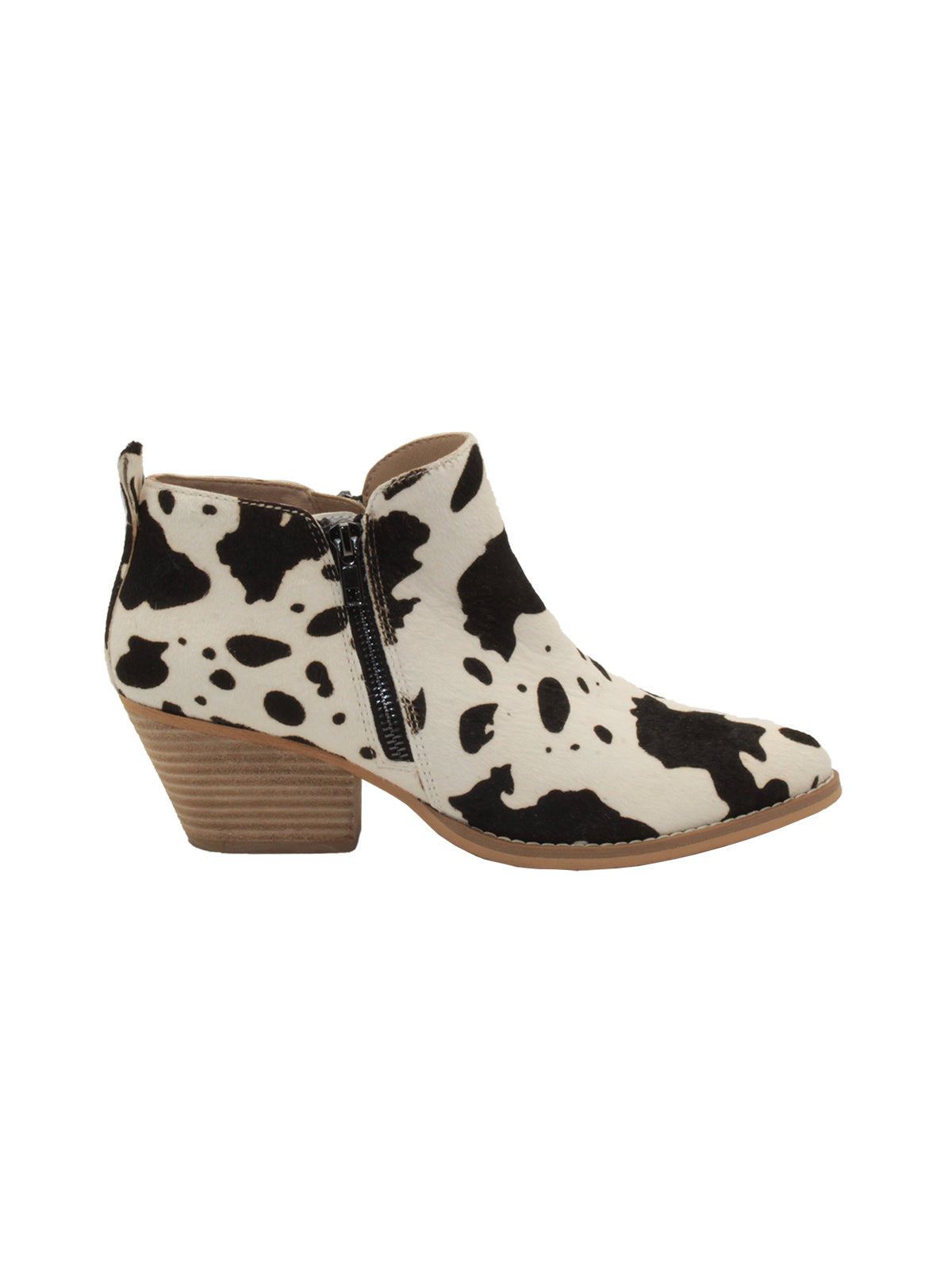 Western inspired Gracemont booties from Very Volatile refresh your wardrobe with on-trend animal print in genuine calf hair. The functioning metal side zippers mean you can slip these on with your favorite pair of jeans and head straight into the weekend.  black white cow
