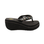 The Gypsy thong wedge sandal by Volatile is crafted in a textured synthetic python material adorned with cased jewels and studs. They feature Volatile’s signature ultra comfort EVA insole for all day comfort, padded textile lining and nonskid rubber traction outsoles to give you all day wear in style. Feel free to dress this sandal up or down or any occasion.